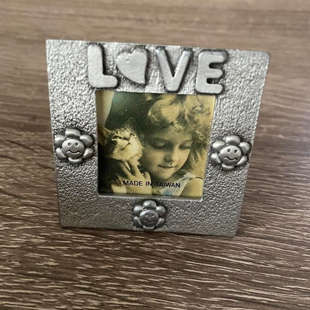 Vintage Silver picture frame with the word 'LOVE' and flower designs